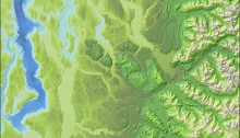 Lidar-derived hillshading with bathymetric and elevation color tints applied.